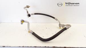 Usagé Tuyau clim Opel Astra K 1.0 SIDI Turbo 12V Prix € 75,00 Règlement à la marge proposé par Autodemontage Vrijhoeven B.V.