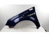 Front wing, left from a Opel Tigra Twin Top, 2004 / 2010 1.4 16V, Convertible, Petrol, 1.364cc, 66kW (90pk), FWD, Z14XEP; EURO4, 2004-06 / 2010-12 2005