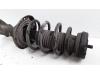 Front shock absorber rod, right from a Opel Astra J (PC6/PD6/PE6/PF6) 1.7 CDTi 16V 110 2010
