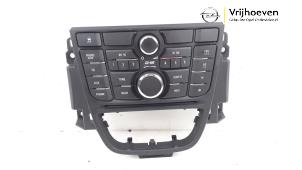 Used Radio control panel Opel Astra J (PC6/PD6/PE6/PF6) 1.6 16V Price € 40,00 Margin scheme offered by Autodemontage Vrijhoeven B.V.