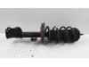 Front shock absorber rod, left from a Opel Corsa D, 2006 / 2014 1.2 16V, Hatchback, Petrol, 1.229cc, 63kW (86pk), FWD, A12XER, 2009-12 / 2014-08 2010