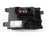 Fuse box from a Opel Corsa D 1.4 16V Twinport 2011