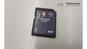 Używane Karta SD do nawigacji Opel Astra Cena € 20,00 Procedura marży oferowane przez Autodemontage Vrijhoeven B.V.