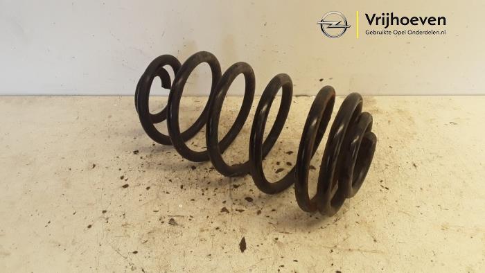 Rear coil spring from a Opel Astra J (PC6/PD6/PE6/PF6) 1.3 CDTI 16V EcoFlex 2013