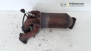 Used Exhaust manifold + catalyst Opel Tigra Twin Top 1.4 16V Price € 200,00 Margin scheme offered by Autodemontage Vrijhoeven B.V.