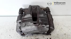 Used Front brake calliper, right Opel Tigra Twin Top 1.4 16V Price € 35,00 Margin scheme offered by Autodemontage Vrijhoeven B.V.