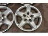 Wheel cover set from a Opel Astra H GTC (L08) 1.6 16V 2007