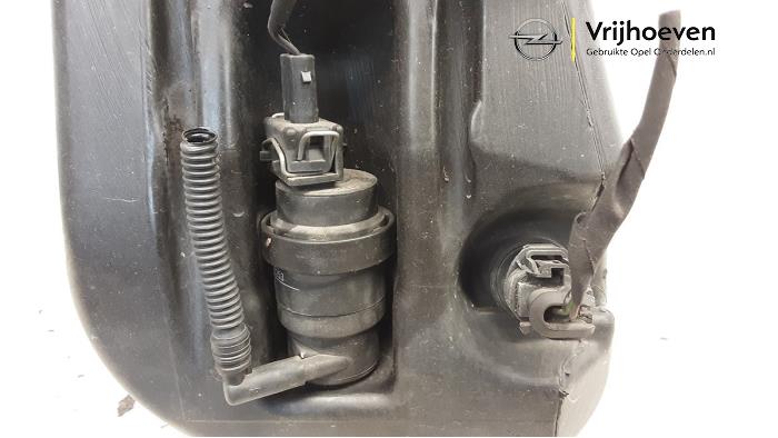 Front windscreen washer reservoir from a Opel Astra H Twin Top (L67) 1.8 16V 2007