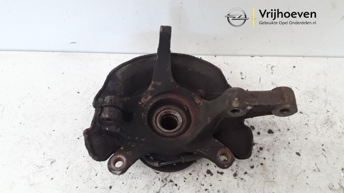 Knuckle, front left from a Opel Agila (B) 1.0 12V 2009