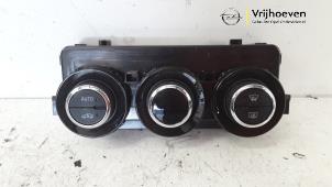 Usados Panel de control de calefacción Opel Adam 1.2 16V Precio € 40,00 Norma de margen ofrecido por Autodemontage Vrijhoeven B.V.