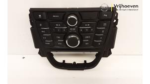 Used Radio control panel Opel Astra J GTC (PD2/PF2) 1.6 SIDI Turbo 16V Motorsport Price € 75,00 Margin scheme offered by Autodemontage Vrijhoeven B.V.