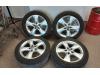 Set of wheels + tyres from a Opel Astra J Sports Tourer (PD8/PE8/PF8), 2010 / 2015 1.6 Turbo 16V, Combi/o, Petrol, 1.598cc, 132kW (179pk), FWD, A16LET, 2010-10 / 2015-10, PD8EJ; PE8EJ; PF8EJ 2011