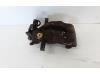Rear brake calliper, left from a Opel Astra H Twin Top (L67) 1.6 16V 2006