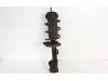 Front shock absorber rod, left from a Opel Corsa E 1.4 16V 2017