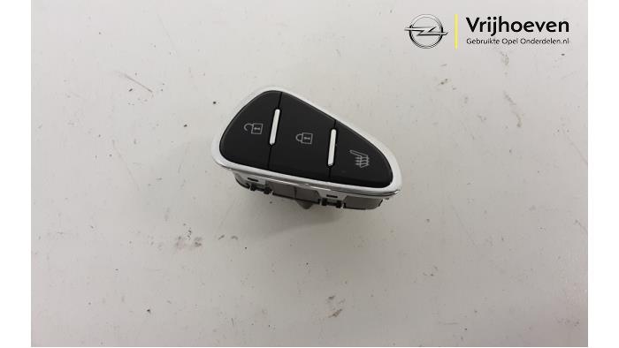 Interruptor de calefactor de asiento de un Opel Corsa E 1.4 16V 2017