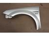 Front wing, left from a Opel Tigra Twin Top 1.4 16V 2004
