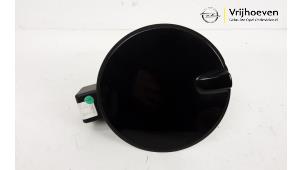 Used Tank cap cover Opel Astra H SW (L35) 1.6 16V Twinport Price € 15,00 Margin scheme offered by Autodemontage Vrijhoeven B.V.