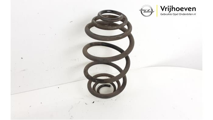 Rear coil spring from a Opel Astra H SW (L35) 1.6 16V Twinport 2008
