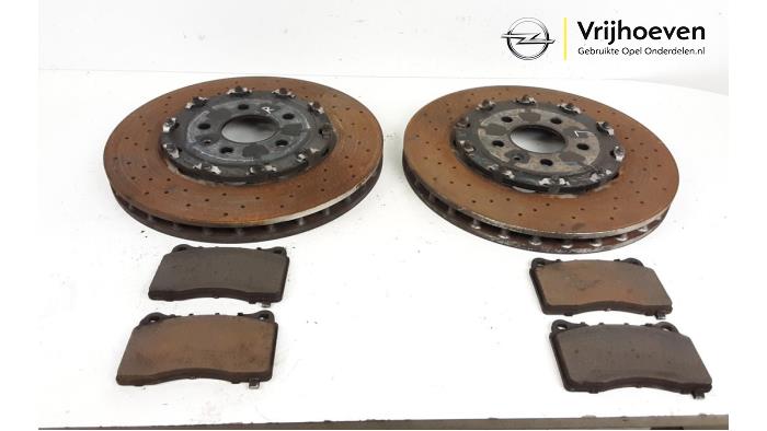 Brake disc + block front from a Opel Astra J GTC (PD2/PF2) 2.0 16V Turbo OPC 2014