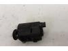 Tank flap lock motor from a Opel Astra H (L48) 1.6 16V Twinport 2004