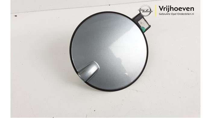 Tank cap cover from a Opel Astra H (L48) 1.6 16V 2008