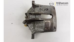 Used Front brake calliper, right Opel Corsa F (UB/UP) 1.2 12V 75 Price € 50,00 Margin scheme offered by Autodemontage Vrijhoeven B.V.