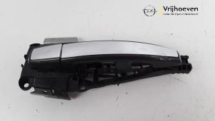 Used Rear door handle 4-door, right Opel Astra J (PC6/PD6/PE6/PF6) 1.4 Turbo 16V Price € 50,00 Margin scheme offered by Autodemontage Vrijhoeven B.V.
