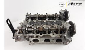 Used Cylinder head Opel Astra K 1.0 SIDI Turbo 12V Price € 300,00 Margin scheme offered by Autodemontage Vrijhoeven B.V.