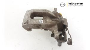 Used Rear brake calliper, left Opel Corsa F (UB/UH/UP) 1.2 Turbo 12V 100 Price € 50,00 Margin scheme offered by Autodemontage Vrijhoeven B.V.