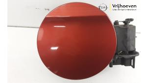 Used Tank cap cover Opel Adam 1.4 Price € 30,00 Margin scheme offered by Autodemontage Vrijhoeven B.V.