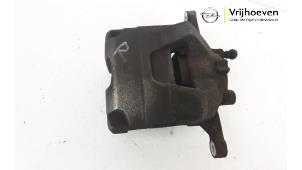 Used Front brake calliper, right Opel Astra J (PC6/PD6/PE6/PF6) 1.6 Turbo 16V Price € 45,00 Margin scheme offered by Autodemontage Vrijhoeven B.V.