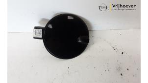 Used Tank cap cover Opel Astra H SW (L35) 2.0 16V Turbo Price € 15,00 Margin scheme offered by Autodemontage Vrijhoeven B.V.