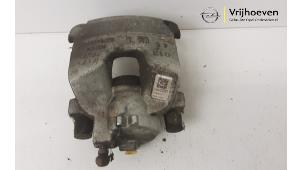 Used Front brake calliper, left Opel Astra K 1.4 16V Price € 50,00 Margin scheme offered by Autodemontage Vrijhoeven B.V.