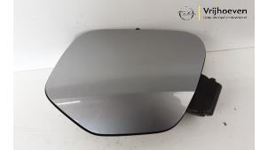 Used Tank cap cover Opel Corsa F (UB/UP) 1.2 Turbo 12V 130 Price € 30,00 Margin scheme offered by Autodemontage Vrijhoeven B.V.