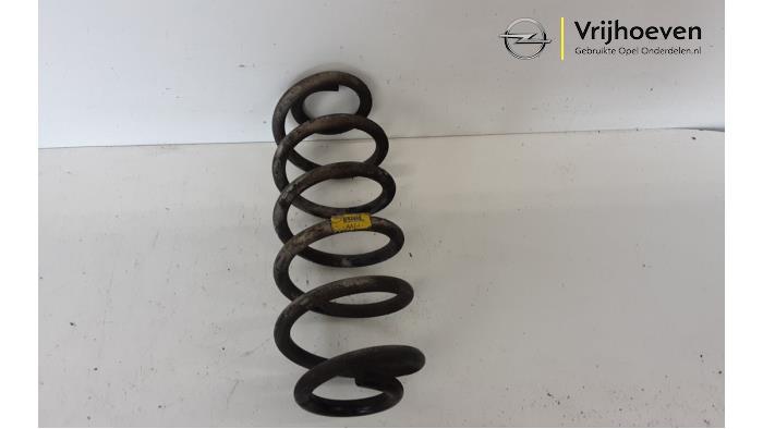 Rear coil spring from a Opel Astra K Sports Tourer 1.6 CDTI 136 16V 2018