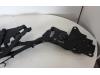 Convertible top hinge from a Opel Astra H Twin Top (L67) 1.8 16V 2009