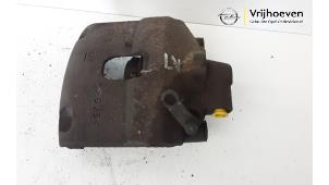 Used Front brake calliper, left Opel Corsa E 1.2 16V Price € 35,00 Margin scheme offered by Autodemontage Vrijhoeven B.V.