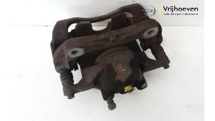 Used Front brake calliper, right Opel Astra J (PC6/PD6/PE6/PF6) 1.6 16V Price € 50,00 Margin scheme offered by Autodemontage Vrijhoeven B.V.