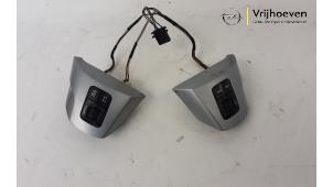 Usados Interruptor de mando de volante Opel Corsa D 1.0 Precio € 25,00 Norma de margen ofrecido por Autodemontage Vrijhoeven B.V.