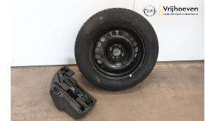 Used Jackkit + spare wheel Opel Corsa D 1.0 Price € 125,00 Margin scheme offered by Autodemontage Vrijhoeven B.V.