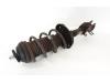 Fronts shock absorber, left from a Vauxhall Adam 1.2 2016