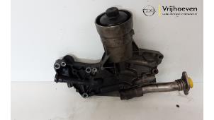 Used Oil filter housing Opel Astra J (PC6/PD6/PE6/PF6) 1.6 Turbo 16V Price € 75,00 Margin scheme offered by Autodemontage Vrijhoeven B.V.