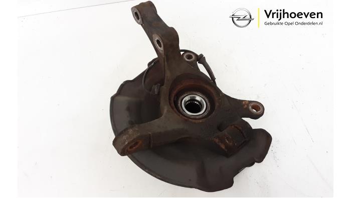 Knuckle, front left from a Opel Agila (B) 1.2 16V 2009