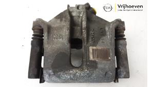Used Front brake calliper, left Opel Corsa F (UB/UH/UP) 1.2 12V 75 Price € 50,00 Margin scheme offered by Autodemontage Vrijhoeven B.V.