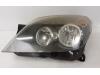 Headlight, left from a Opel Astra H (L48), 2004 / 2014 1.4 16V Twinport, Hatchback, 4-dr, Petrol, 1.364cc, 66kW (90pk), FWD, Z14XEP; EURO4, 2004-03 / 2010-10 2008