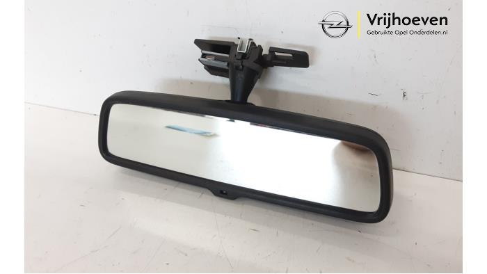Rear view mirror from a Opel Corsa D 1.2 16V 2006