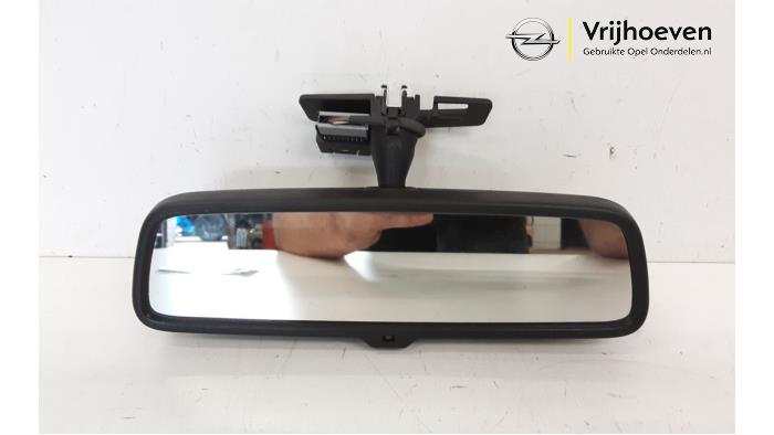Rear view mirror from a Opel Corsa D 1.2 16V 2006