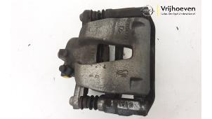 Used Front brake calliper, right Opel Adam 1.4 16V Price € 25,00 Margin scheme offered by Autodemontage Vrijhoeven B.V.