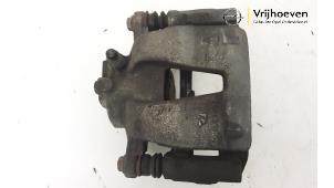 Used Front brake calliper, left Opel Adam 1.4 16V Price € 25,00 Margin scheme offered by Autodemontage Vrijhoeven B.V.