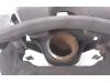 Front brake calliper, right from a Opel Insignia Sports Tourer 2.0 CDTI 16V 160 Ecotec 2010